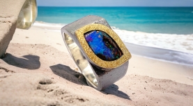 BLUE EYE BOULDER OPAL RING IN OXID SILVER AND GOLD