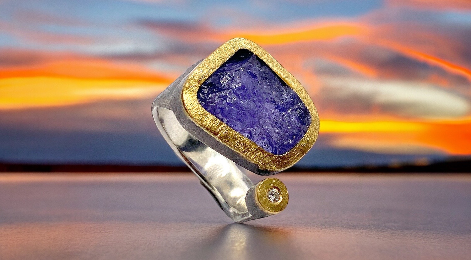 irregular rough tanzanite ring with diamond in silver and gold