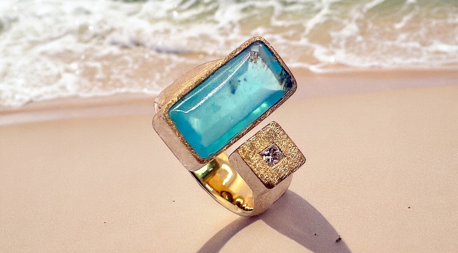 rectangular blue opal ring with diamond princess cut in gold