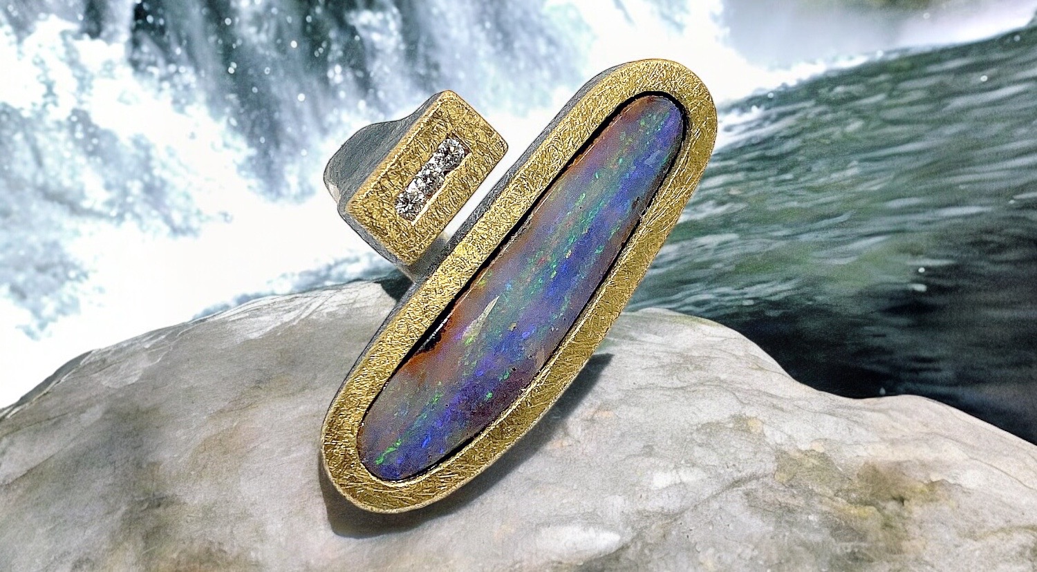 large oval purple opal ring with 3 diamonds in silver and gold