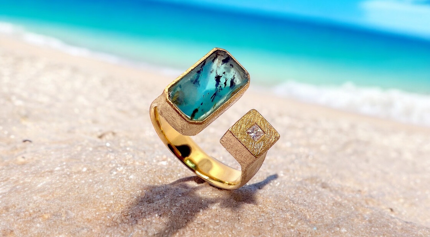 rectangular dendritic blue andean opal ring with diamond princes cut in gold