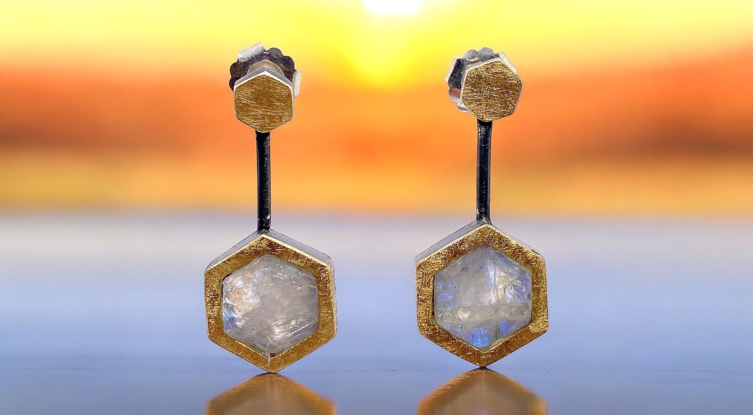 hexagonal rough moonstone earrings in silver and gold