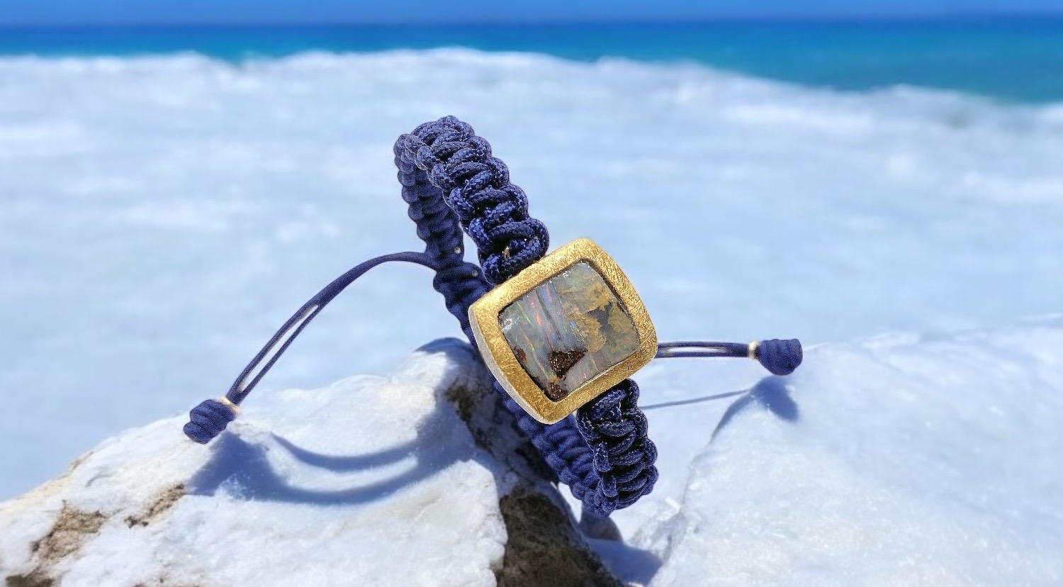 squared boulder opal dark blue macrame bracelet in silver and gold